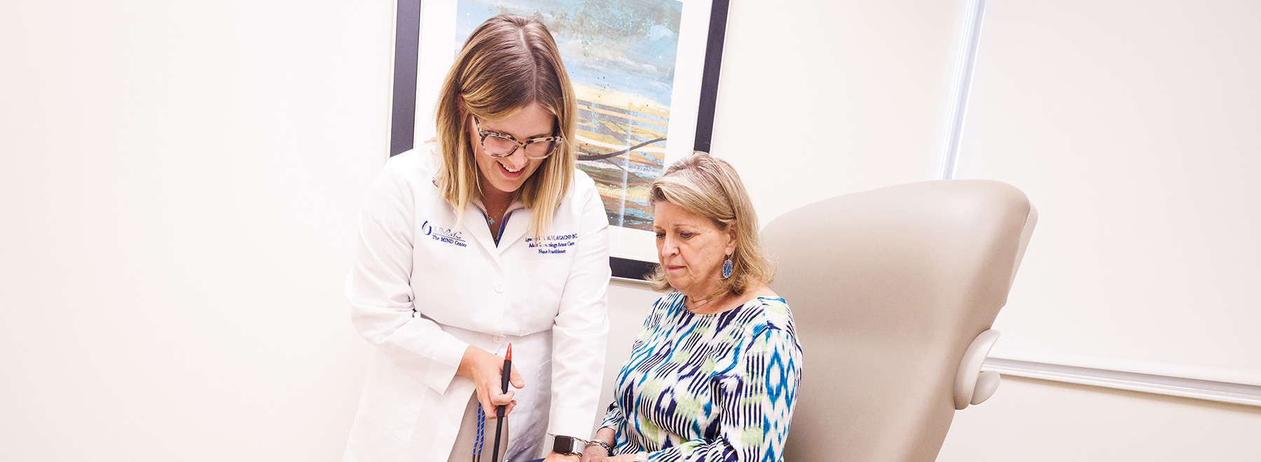 A doctor examining a geriatrics patient.